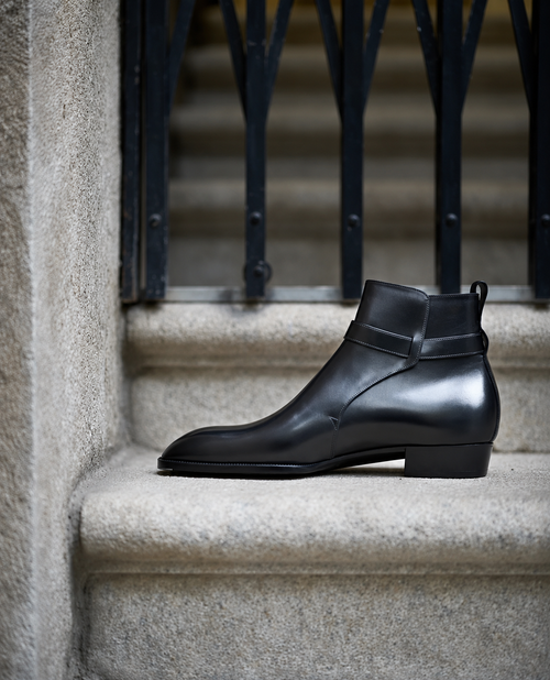 Zalcaro Black Leather Buckle Boots for Men crafted from premium genuine leather with a signature buckle strap, polished finish, and elegant almond-toe design.