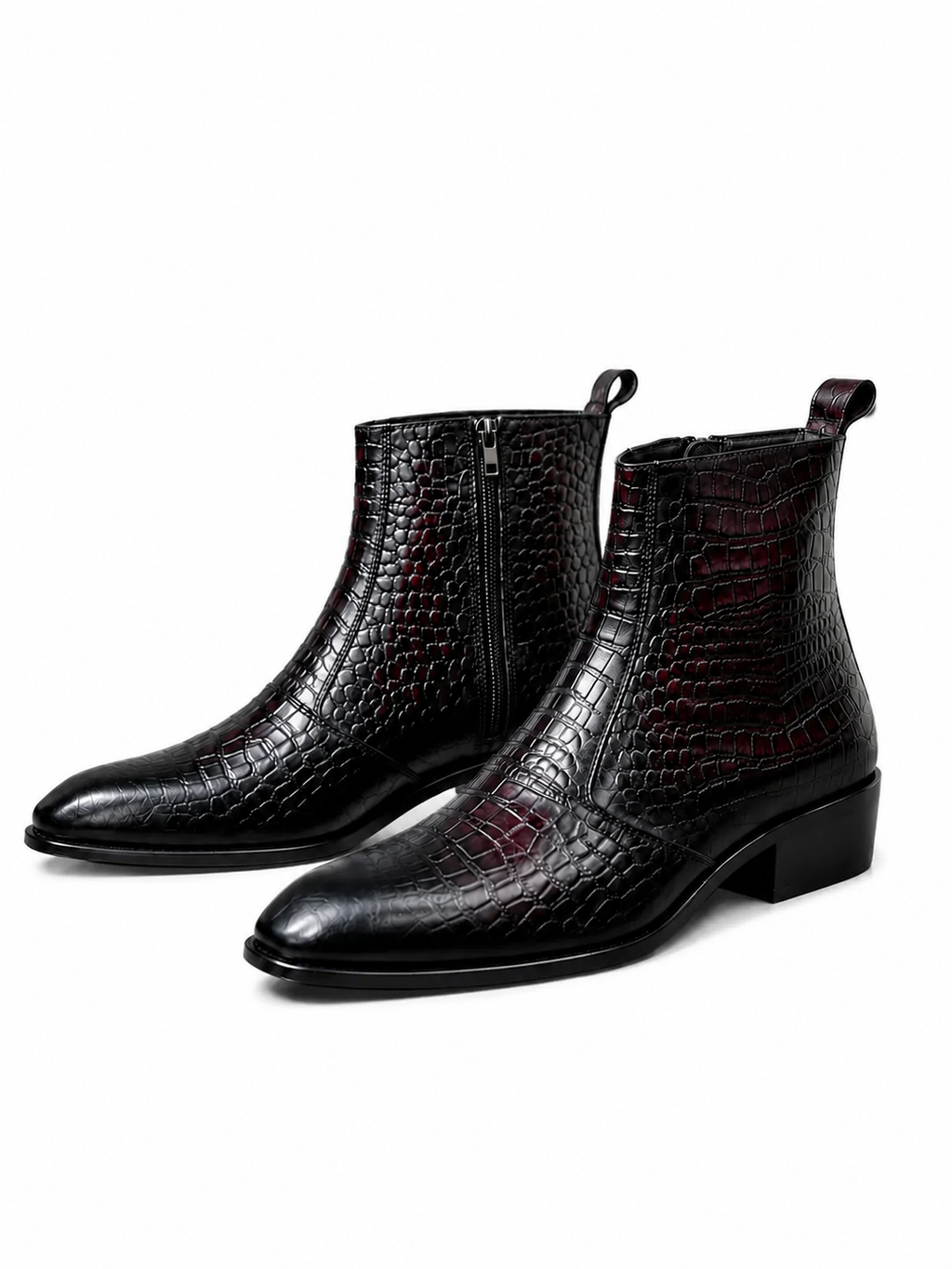 A pair of black crocodile-embossed leather ankle boots with low block heels and side zippers, shown on a plain white background.